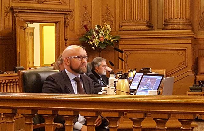 Supervisor Rafael Mandelman listens to presentations on the city's collection of sexual orientation and gender identity data at Thursday's hearing. Photo: Cynthia Laird