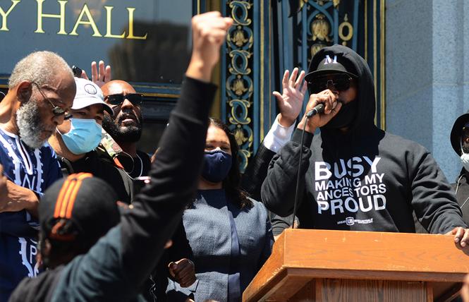 Actor Jamie Foxx speaks to several hundred people outside San Francisco City Hall Monday, June 1, who were protesting the police killing of George Floyd. Photo: Rick Gerharter