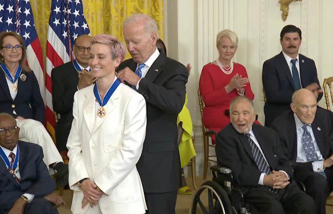 President Joe Biden awarded the Presidential Medal of Freedom to lesbian soccer star Megan Rapinoe during a July 7 ceremony. Photo: Screenshot/YouTube White House Channel