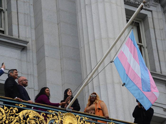 Mayor London Breed raised the trans flag outside City Hall in August 2022. Photo: Rick Gerharter